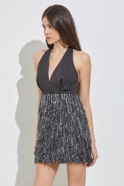 Chic and fab, this Heather fringe mini dress will showcase your curves and give off a flirty flair. This halter features a plunging neckline, high-rise waist, a mini-length hem with a chic fringe skirt, and a form-enhancing silhouette. 
