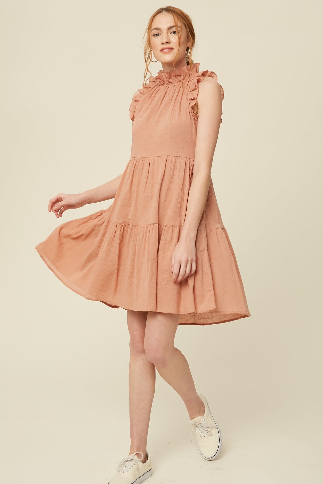 Crafted from breezy textured cotton the Bianca boast a flattering ruffled halter neckline , keyhole back with ties and descends into a tiered knee-grazing silhouette. This classic linen lined dress is beautifully made and makes a wonderful impression for years to come. Please note that each piece in the Deerfield Collection has pockets.www.hoytietoytie.com