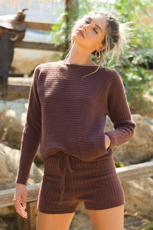 Make heads turn all season in the exclusive Olivia 2 piece lounge set. Featuring a soft  long sleeve boat neck sweater with the matching sweater drawstring waist shorts. Can be worn inside or outside and is ideal as a fashion combination. Embrace your inner peace.