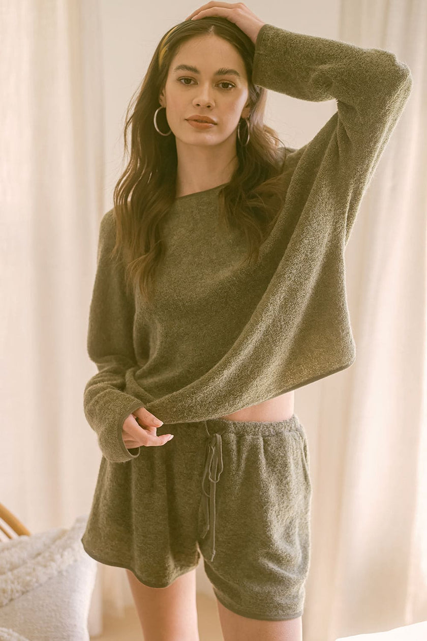 This sweet Camilla lounge short set  takes comfort to the next level. The soft textured terry blend is perfectly suited to be worn inside or outside the home. Camilla is cut for a traditional fit with a round neck and long sleeves. Elastic waist shorts with draw string and pockets complete the look. www.shopthetags.com