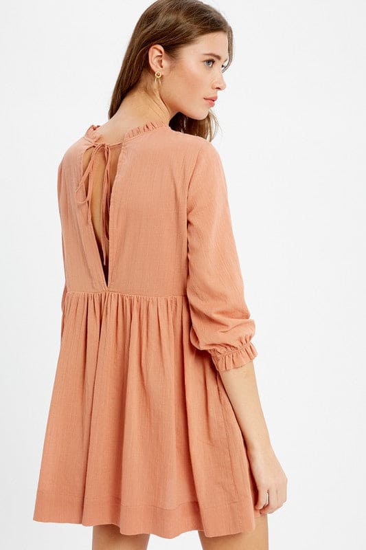 Featuring a breathable linen textured cotton fabric composition, ruffle neck, 3/4 puffed sleeves with ruffles on the cuffs, Kendal was meticulous made to please. A free flowing construction with side seam pocket and keyhole with tie string on the back. The Kendal offers a unique blend of vintage luxury and classic styling perfect for any occasion.www.shopthetags.com