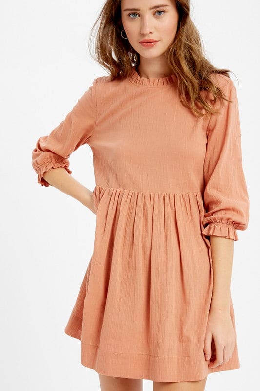 Featuring a breathable linen textured cotton fabric composition, ruffle neck, 3/4 puffed sleeves with ruffles on the cuffs, Kendal was meticulous made to please. A free flowing construction with side seam pocket and keyhole with tie string on the back. The Kendal offers a unique blend of vintage luxury and classic styling perfect for any occasion.www.shopthetags.com