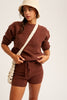 Make heads turn all season in the exclusive Olivia 2 piece lounge set. Featuring a soft  long sleeve boat neck sweater with the matching sweater drawstring waist shorts. Can be worn inside or outside and is ideal as a fashion combination. Embrace your inner peace.