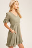 This baby doll style is made from textured woven fabric, fully lined and is cut to a flattering loose fit for a playful yet sophisticated look. Our round-neck babydoll dress featuring puffed sleeves with elastic cuffs with cord accent, 4 buttons on the  back closure and a full, flirty ruffled hem.  This picture shows side pockets.Wear as is, or add definition to the elasticized waist using a fashionable belt.  Classic Style and a staple for every wardrobe. www.shopthetags.com